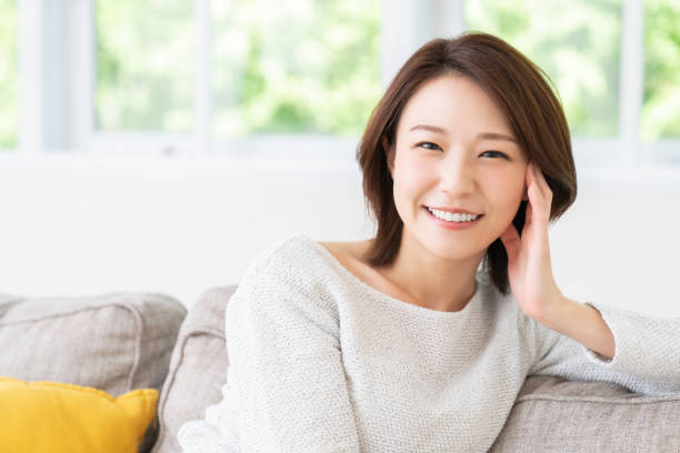 istock attractive asian woman relaxing 1457574394