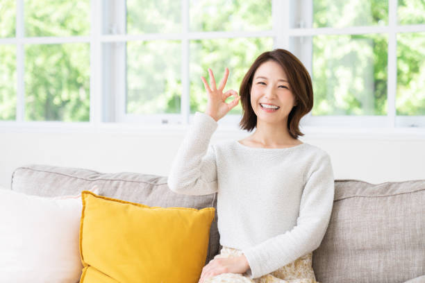 istock attractive asian woman relaxing 1457574440