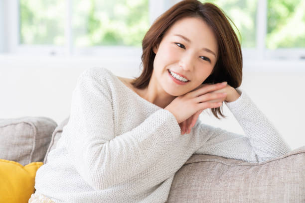 istock attractive asian woman relaxing 1457575033