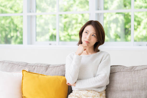 istock attractive asian woman , think 1457575080