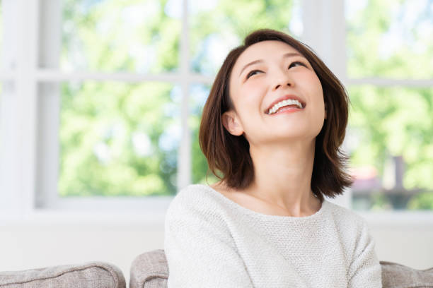 istock attractive asian woman relaxing 1457575178