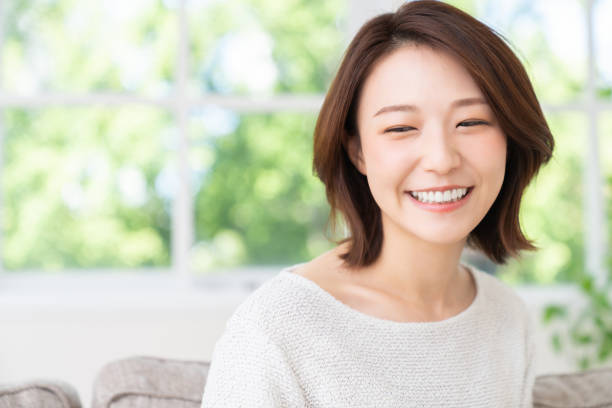 istock attractive asian woman relaxing 1457575332