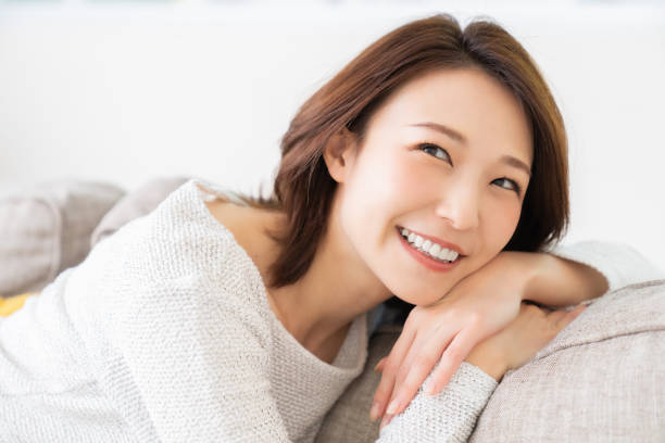 istock attractive asian woman relaxing 1457575370
