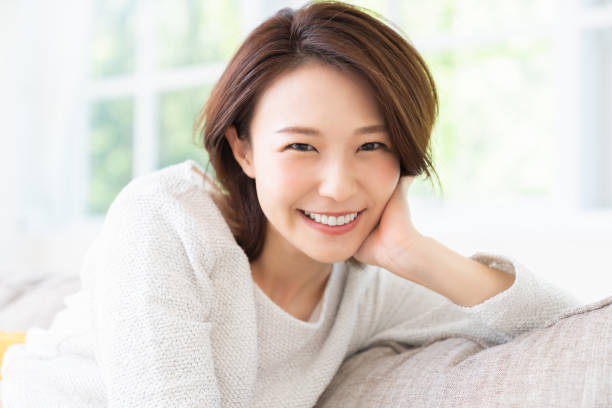 istock attractive asian woman relaxing 1457575381