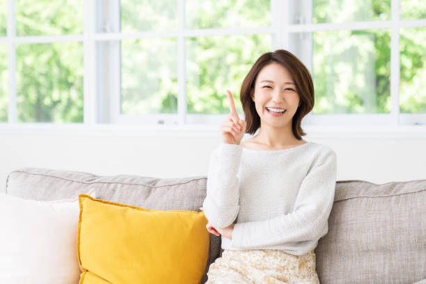 istock attractive asian woman relaxing 1457575393