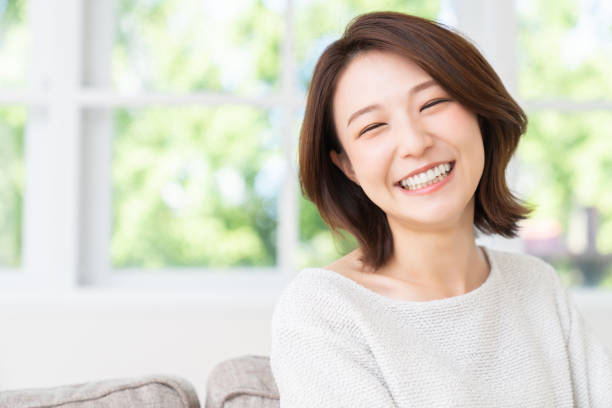 istock attractive asian woman relaxing 1457575411