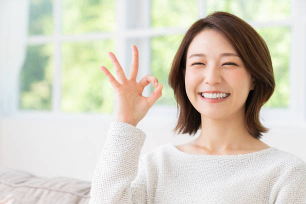 attractive asian woman relaxing stock photo