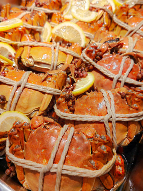 istock Group of crabs with lemon ready to eat. 1457575666