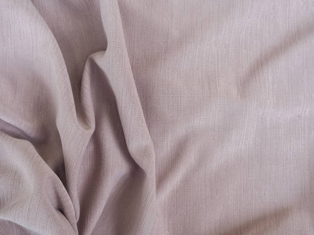 istock Fabric texture of natural cotton, wool, silk or linen textile material. Grey fabric background 1457578150