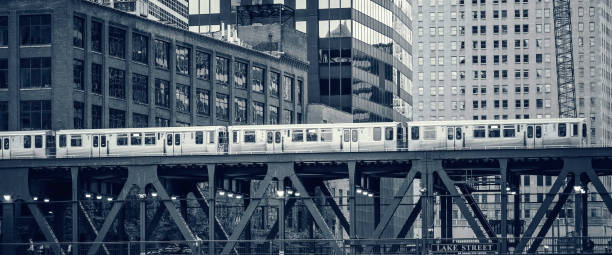 istock Black and white view of railway train in Chicago 1457579226