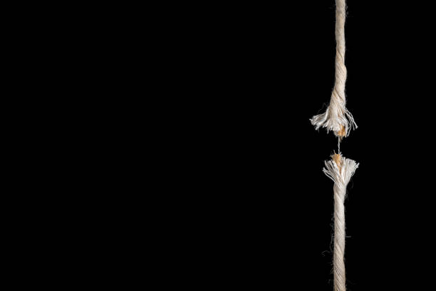 istock Rope hangs together only by a thin thread with text free space for individual adjustments 1457581735