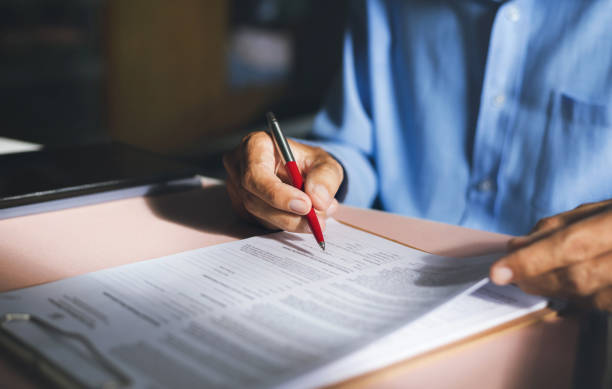 business and finance, people working Close-up view on desk office, businessman signing a contract of investment or insurance, legal agreement on the table, Starting successful partnership with entrepreneur or companie, making good deal life insurance stock pictures, royalty-free photos & images