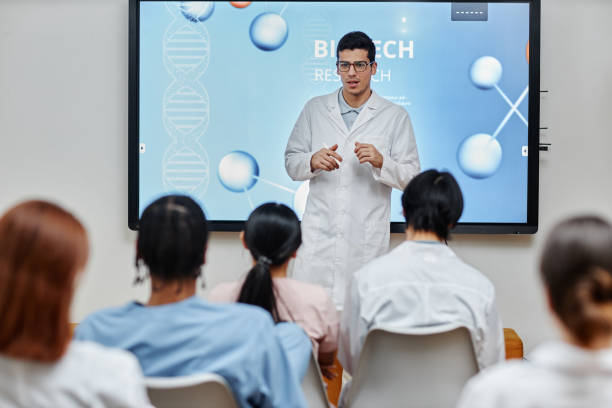 istock Medical professional giving lecture or presentation standing at seminar 1457587332