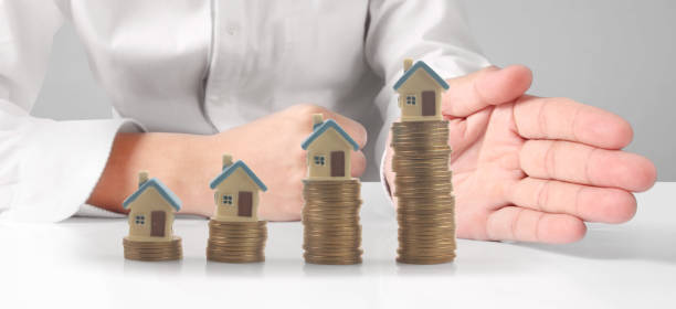 istock House Residential Structure in  hand 1457592365