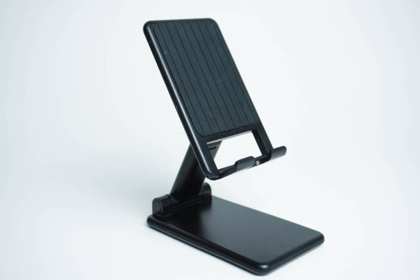 istock Black Mobile phone holder isolated on white background 1457593504