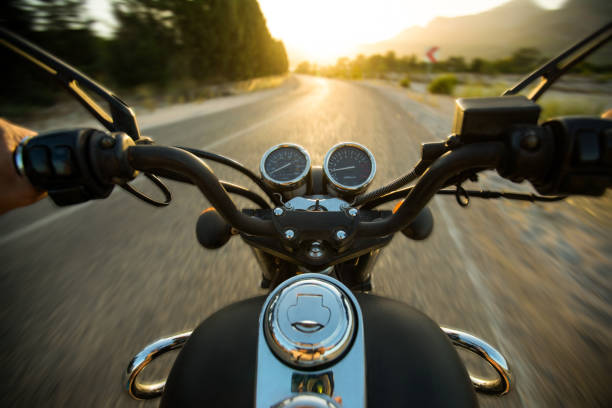 Traveling on a motorcycle on the roads stock photo