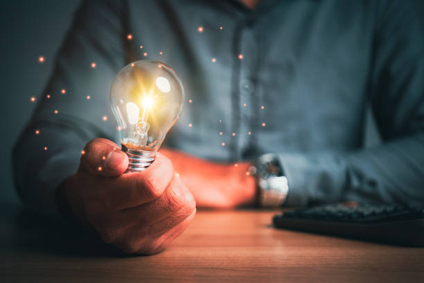istock man holding a light bulb Innovation through Inspiring Ideas and Ideas, Creativity, Ideas Innovation and Inspiration Ideas Technological innovation ideas. Sustainable business development 1457597591