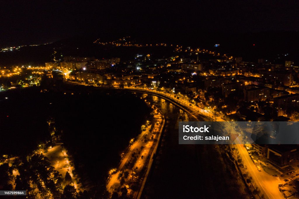 Aerial view of Cluj Napoca city by night. Urban landscape Aerial view of Cluj Napoca city by night. Urban landscape with illuminated streets, Romania Cluj Napoca - Romania Stock Photo