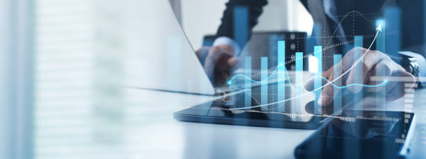 istock Business analysis. Businessman working on laptop computer analyzing finance sales data and economic growth graph chart and financial report, business and technology concept. 1457616174