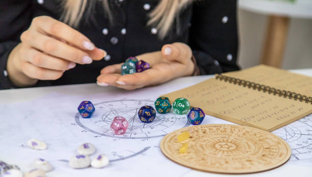 istock Woman numerologist astrologer counts numbers. Selective focus. 1457619593