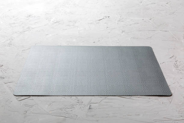 istock Perspective view of grey tablecloth for food on cement background. Empty space for your design 1457621915
