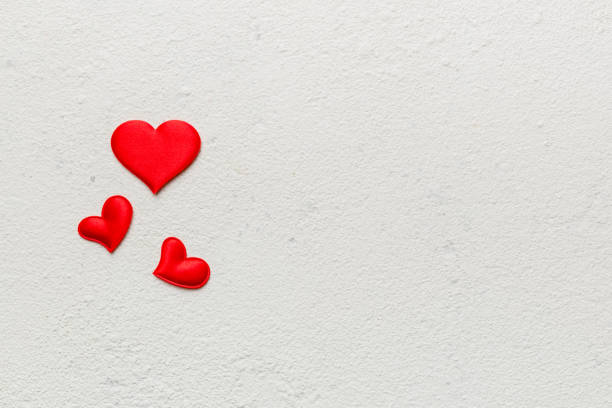 istock Valentine day background with red hearts, top view with copy space 1457621939