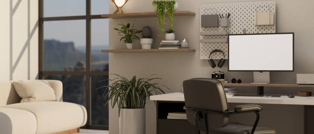 istock Modern comfortable home office or working space in living room interior with computer mockup 1457624039