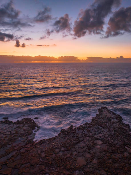 istock Dawn at the seaside and rock platform 1457631003