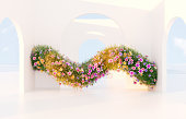 Spring floral installation scene with geometric arch form.