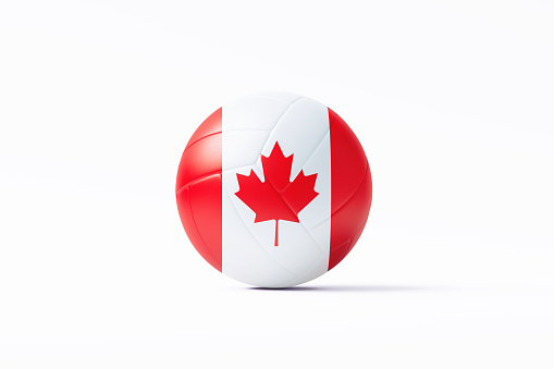 Volleyball ball textured with Canadian flag on white background. Front view. Horizontal composition with clipping path and copy space. Volleyball concept.