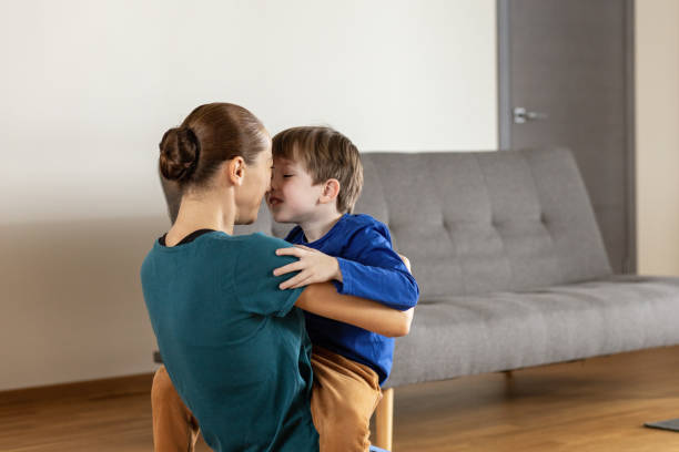 istock White 40 year old woman hugging her 5 year old son 1457637644