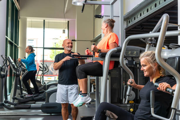istock Middle-aged friends in the gym. 1457641470