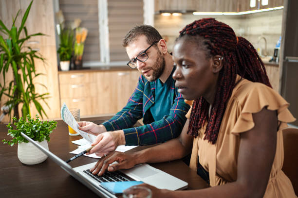istock Couple reviews their finances 1457642152