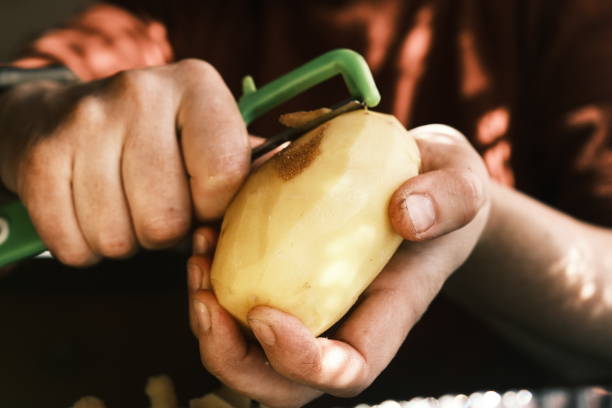 Female hands are preparing vegetable for cooking