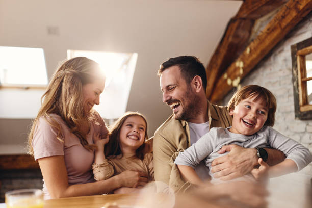 istock Cheerful family having fun together at home. 1457643855