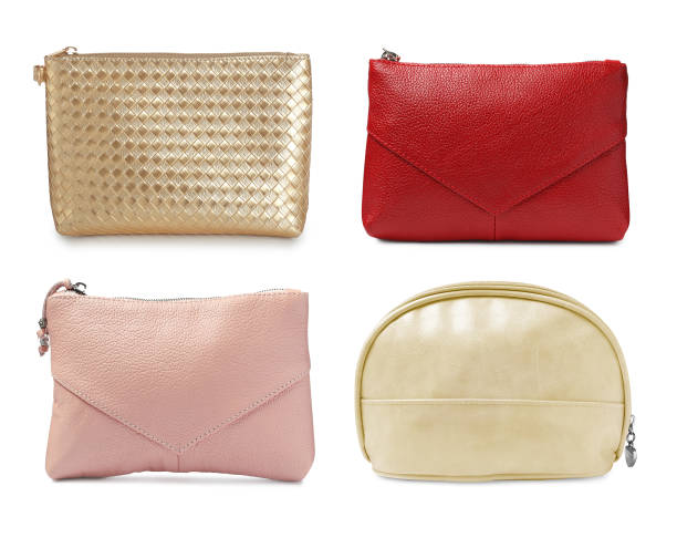 Set with different cosmetic bags on white background