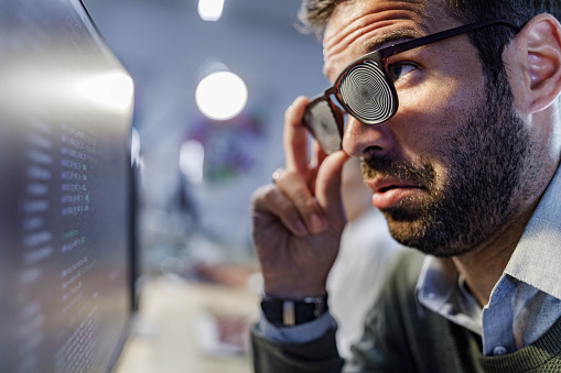 Computer Confusing Coding Confused Male Programmer Reading Codes On A Pc In The Office Stock ...