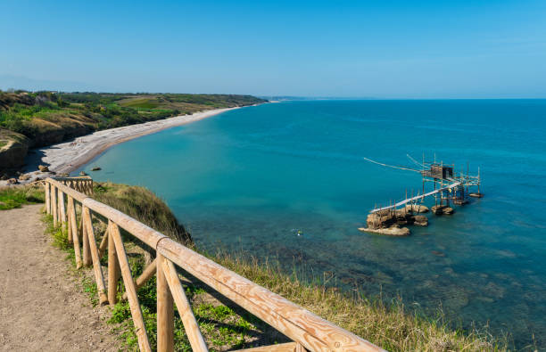 Punta Aderci (Vasto, Italy) The Trabocchi Coast, on Adriatic sea, province of Chieti, Abruzzo. Here the famous trabucco of the wonderful Natural Reserve of Puta Aderci, with beautiful sea and beach chieti stock pictures, royalty-free photos & images