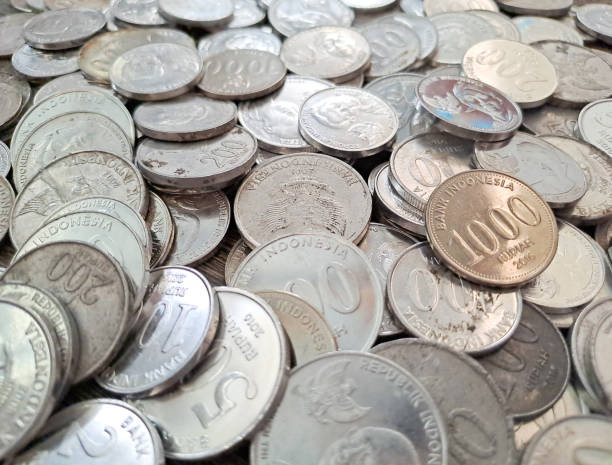 istock Full Frame Shot Of Indonesian Coins rupiah. 1457649623