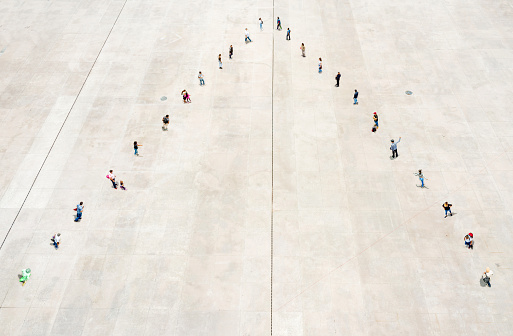 Aerial view of group of people in shape of pyramid