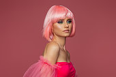 Beautiful woman with bobbed pink hair