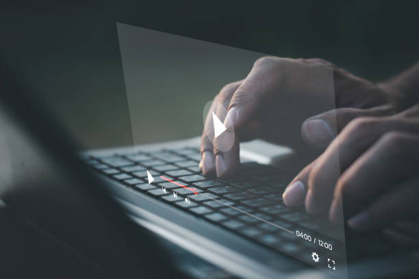 istock Man hand using laptop computer to watching and live streaming window. Online live stream window. Video streaming on internet concept. 1457662772