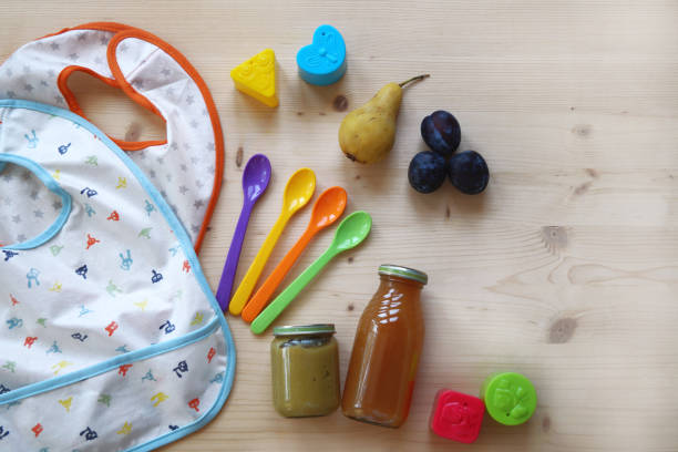 Baby food Baby food baby spoon stock pictures, royalty-free photos & images