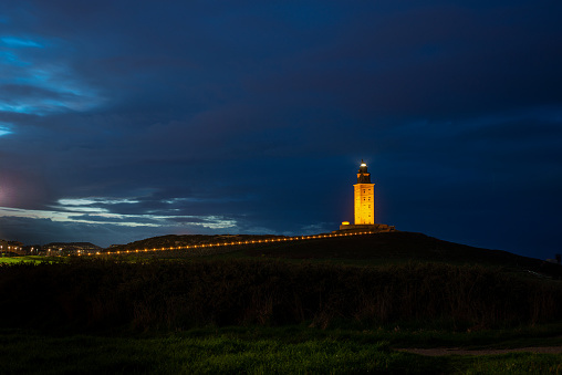 night scenery of the emblematic lighthouse of the city of la coruña