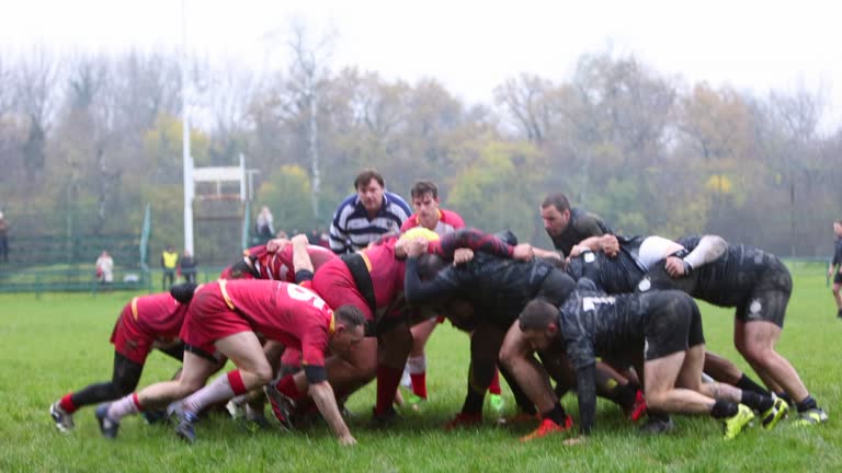 Rugby teams performing scrum