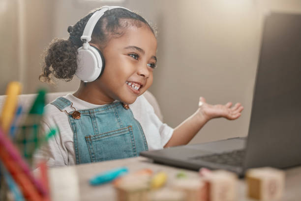 istock Confused, little girl and video call with elearning laptop for remote lesson on educational app. Knowledge, development and education of black child at home in communication on internet 1457670150