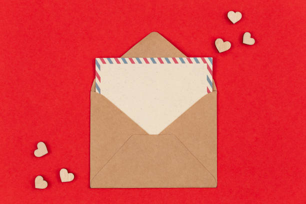 istock Envelope and blank postcard on a red background, Valentine's Day concept. 1457672377