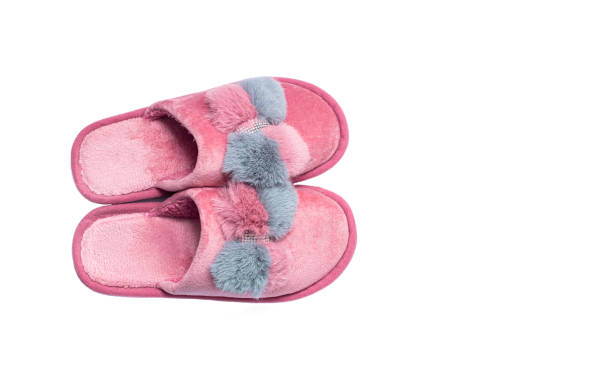 istock Home female pink and grey slippers on a white background. 1457678806