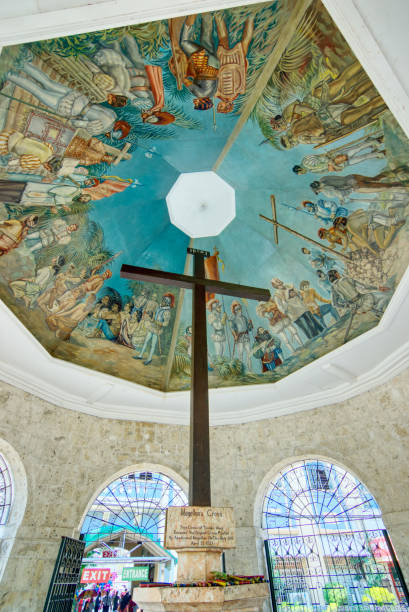 Magellan's Cross Cebu, Philippines - August 10, 2017: Magellan's Cross in a chapel in Cebu City, Philippines. The original cross, planted by the order of Ferdinand Magellan, is encased inside this cross cebu province stock pictures, royalty-free photos & images