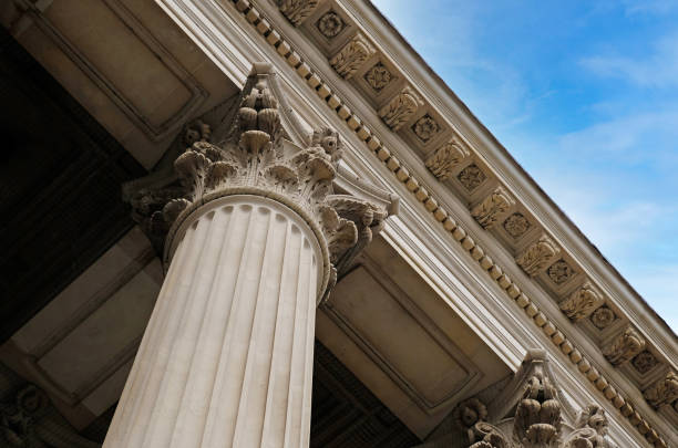 istock Classic architectural column. Details of architecture of historical construction. Element of exterior building with columns and Stucco molding on ceiling of architectural structure in London, UK. 1457684327